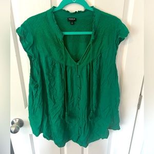 Forest green work top. Soft and flattering with a loose fit.